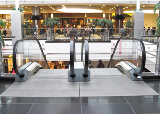View from the top of an escalator at a shopping mall